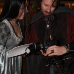Arwen and Aragorn going over wedding pictures.