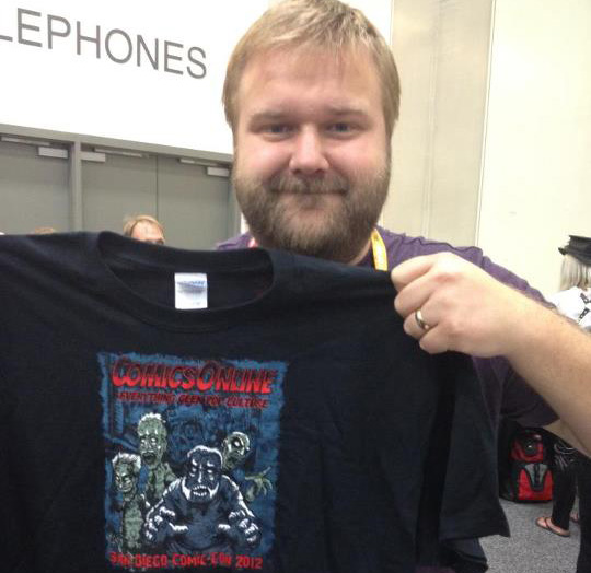 Robert Kirkman models his tee shirt